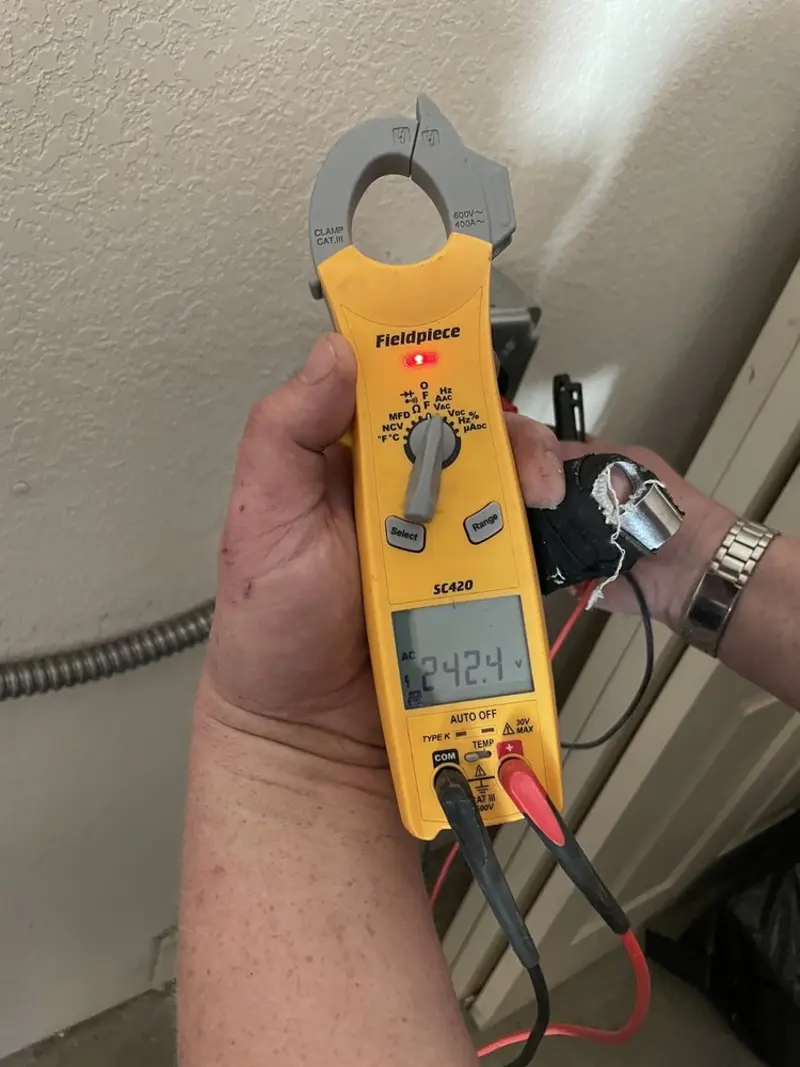 Voltage testing with clamp meter during Hot Tub / Pool Electrical Wiring in Mount Penn